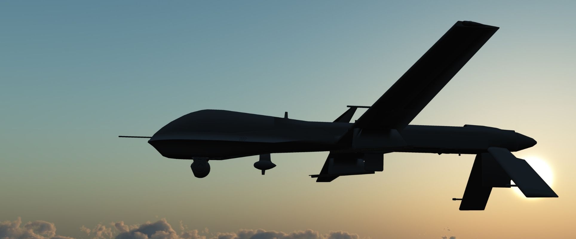A military drone flying above the clouds.